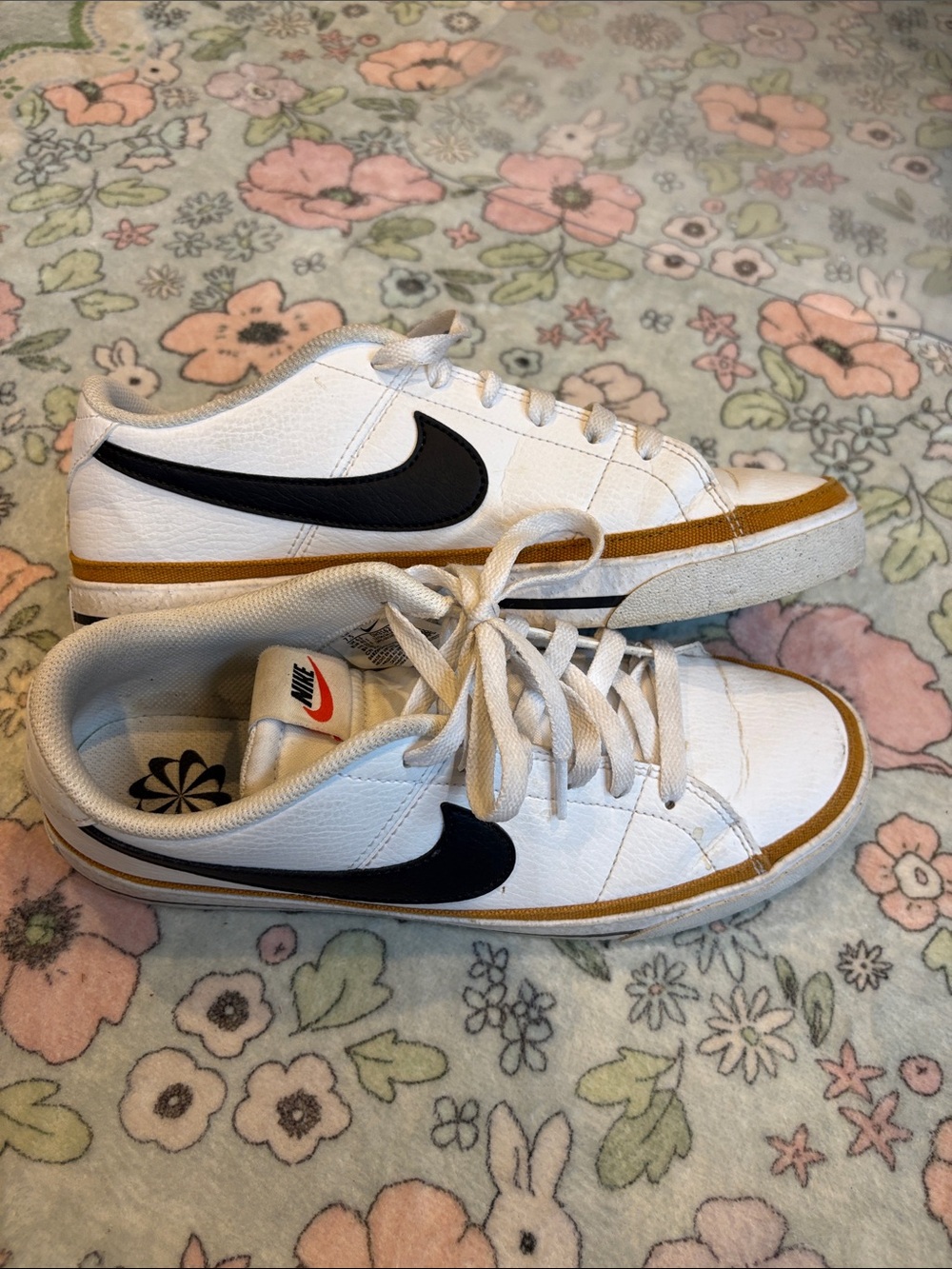 Nike White Low-Top Sneakers with Black Swoosh and Tan Trim